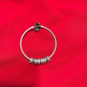 Pandora mesh bracelet with four charms